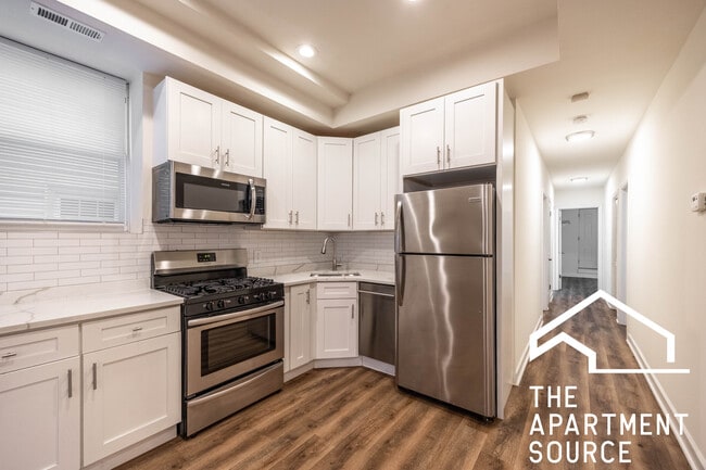 Building Photo - 2112 N Campbell Ave Unit GDN