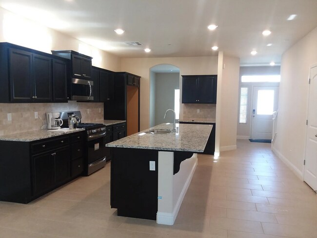 Photo - Beautiful Two-Story Home Featuring Granite Kitchen, Large Island & Spa-Style Primary Suite