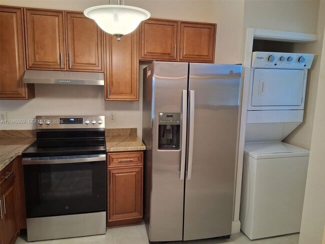 Building Photo - 10907 Royal Palm Blvd Unit 10907