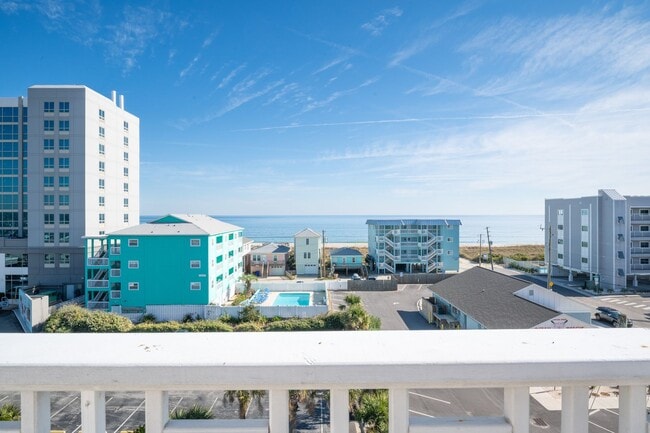 Photo - ENJOY OCEAN BREEZES FROM THIS FURNISHED OF... Unit 106