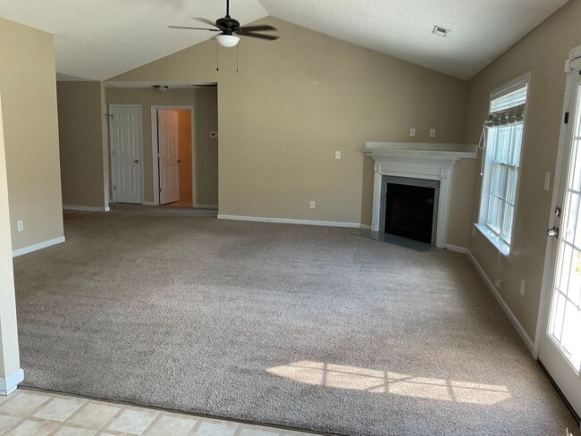 Photo - Spacious 3 bedroom 2 bath home! Walk in closet! Galley Kitchen! Open floor plan! Fenced in back y...