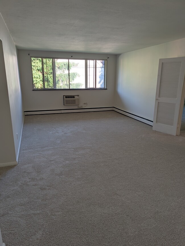Building Photo - 700 East Ave Unit All s currentlyleased