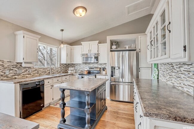 Photo - Spacious West Jordan Home Backing to Duck Pond & Trails | Large Yard + Garage