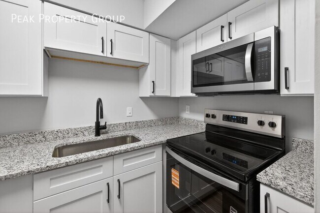 Building Photo - 6419 Montgomery Rd Unit A4