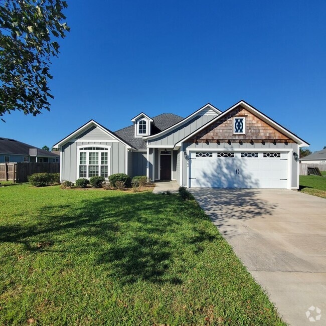 Building Photo - Spacious 4-Bedroom Home with Modern Featur...
