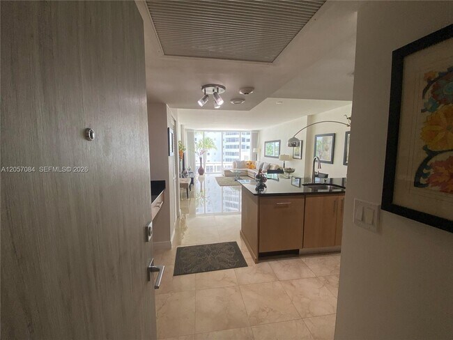 Building Photo - 10275 Collins Ave Unit 215