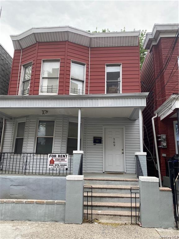 Building Photo - 769 E 223rd St Unit 1