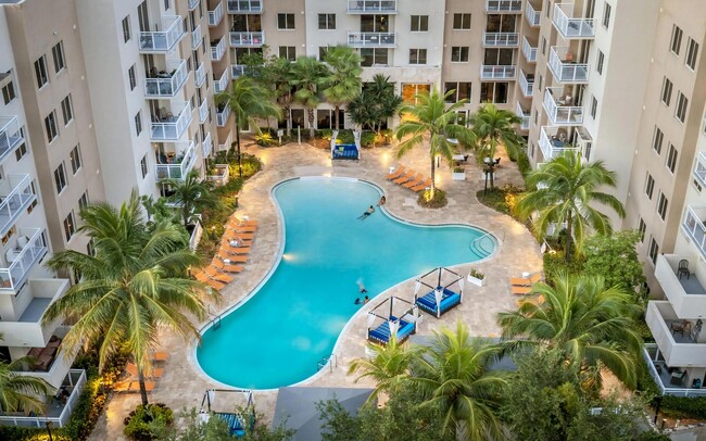 Resort Style Pool with Lounge Seating - The Manor at CityPlace Apartments