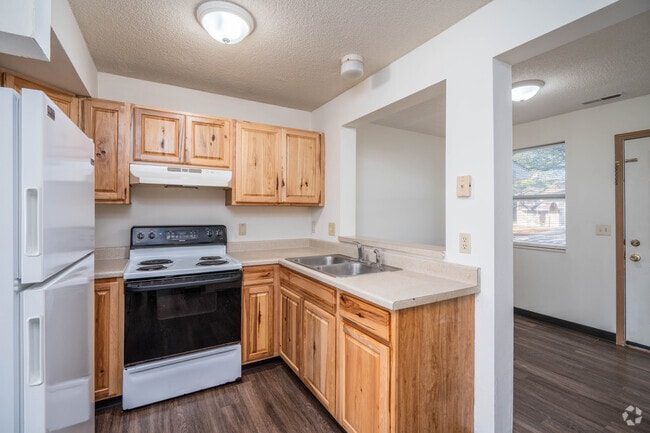 3 habitaciones, 2 baños - 1100 pies cuadrados - Cocina - Timber Ridge Townhomes