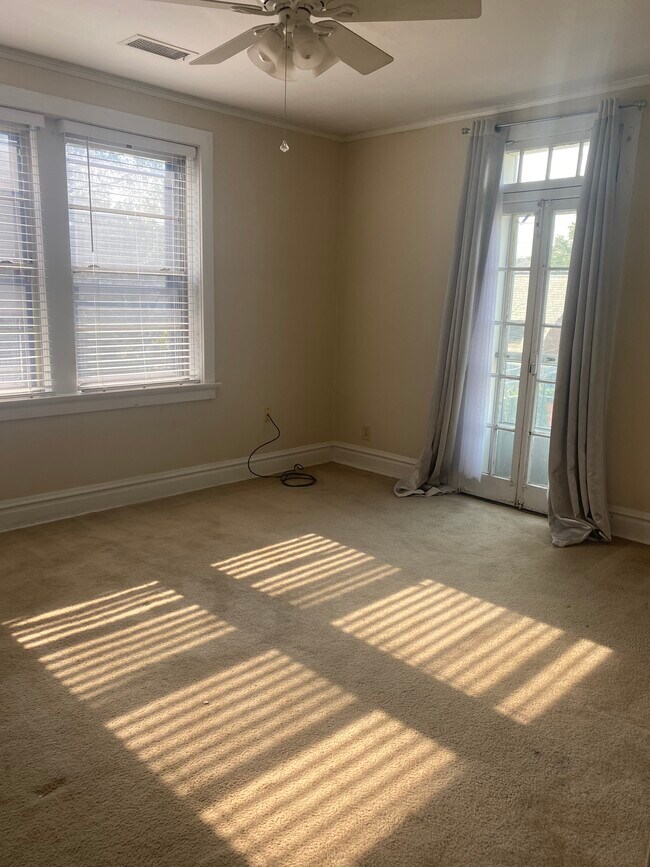 Larger bedroom with balcony - 444 S Hanley Rd Unit 2S