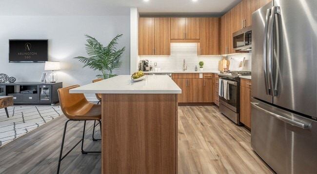 Fully Equipped Kitchen with Stainless Steel Appliances Dishwasher and Garbage Disposal - Arlington 360 Apartments