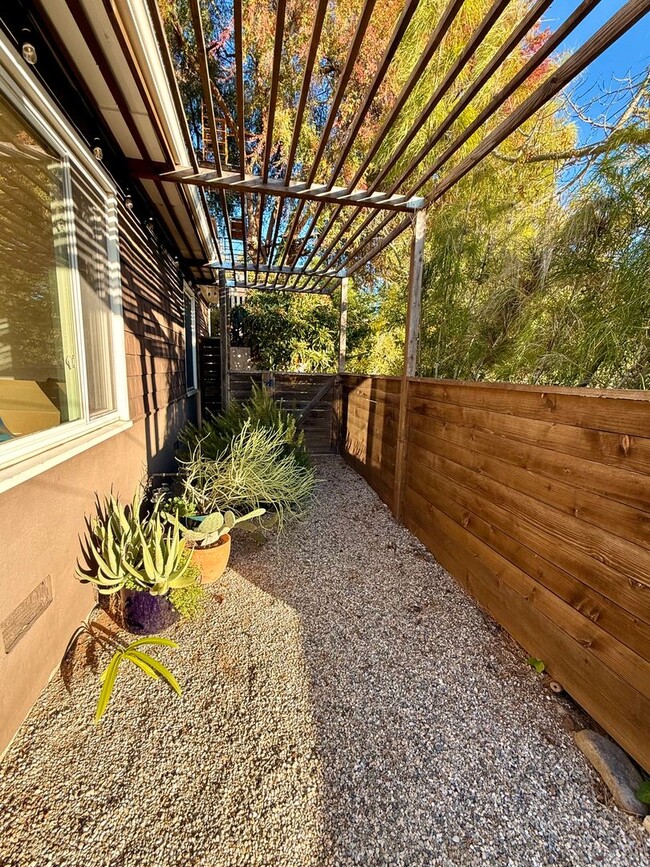 Photo - Hilltop Highland Park Sanctuary with Views, Private Gated Yard, In Unit Laundry, Parking & Abunda...