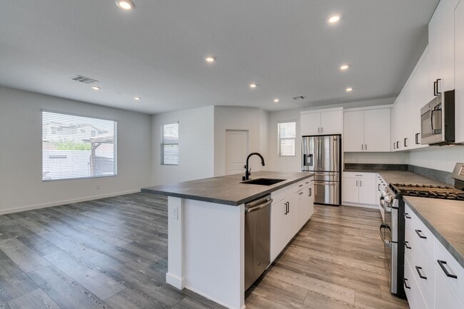 Photo - Spacious 4 Bedroom + Loft Tule Springs Home with Heated Pool & 3-Car Garage