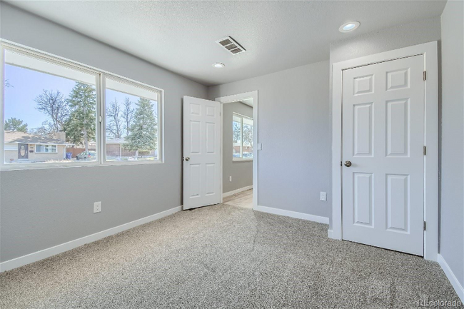 Building Photo - 1881 E 84th Ave Rental