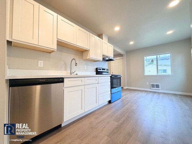 Photo - MOVE-IN SPECIAL! Completely Renovated 2 Bedroom Home Near PLU | New Kitchen & Stainless Appliances