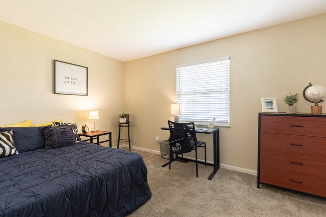 Experience comfort and functionality in this beautifully designed bedroom. - Oxford West