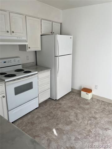 Building Photo - 2435 S Xanadu Way Unit C
