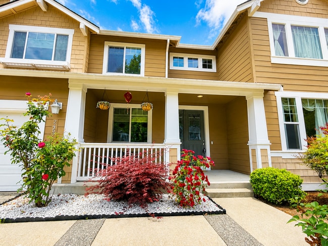 Photo - Spacious 4-Bedroom Home with Bonus Room, Trex Deck & Pergola in Prime Maple Valley