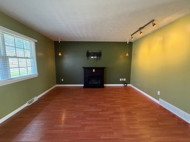 Photo - Goodyear Heights Gem with Fireplace, Attached Garage & Massive Backyard