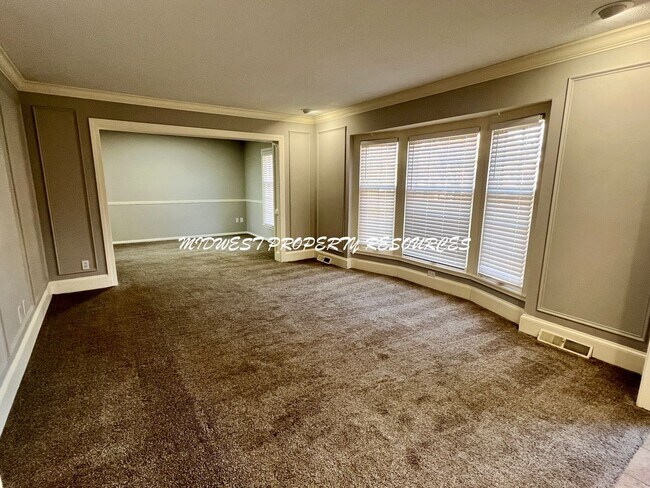 Photo - Spacious 4-Bedroom, 3-Bathroom Home with Fenced Yard and Bonus Spaces!