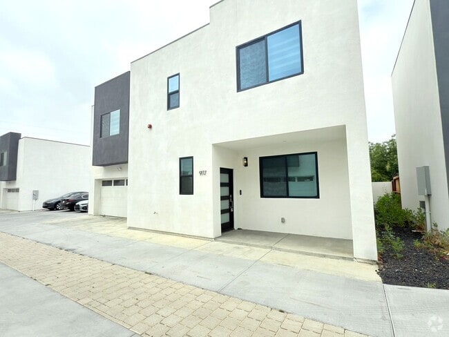 Building Photo - Chic Modern Living in Panorama City – 4 Be... Rental