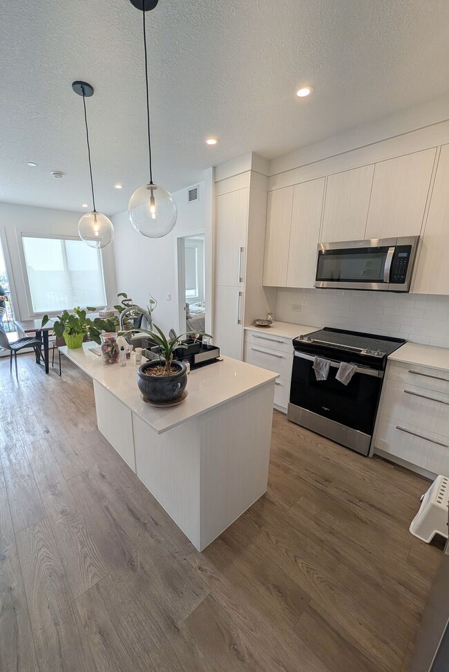 Building Photo - Modern 2 Bedroom + Den Condo with Underground Parking in Skyview Ranch (IP059) Unit 2402