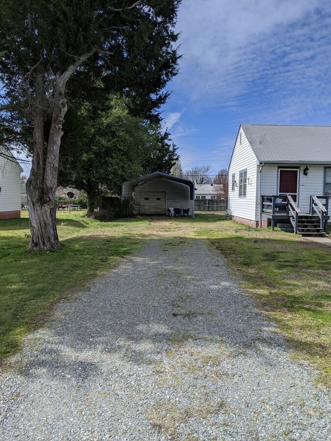 Photo - Three bedroom / one bath with Garage and Carport