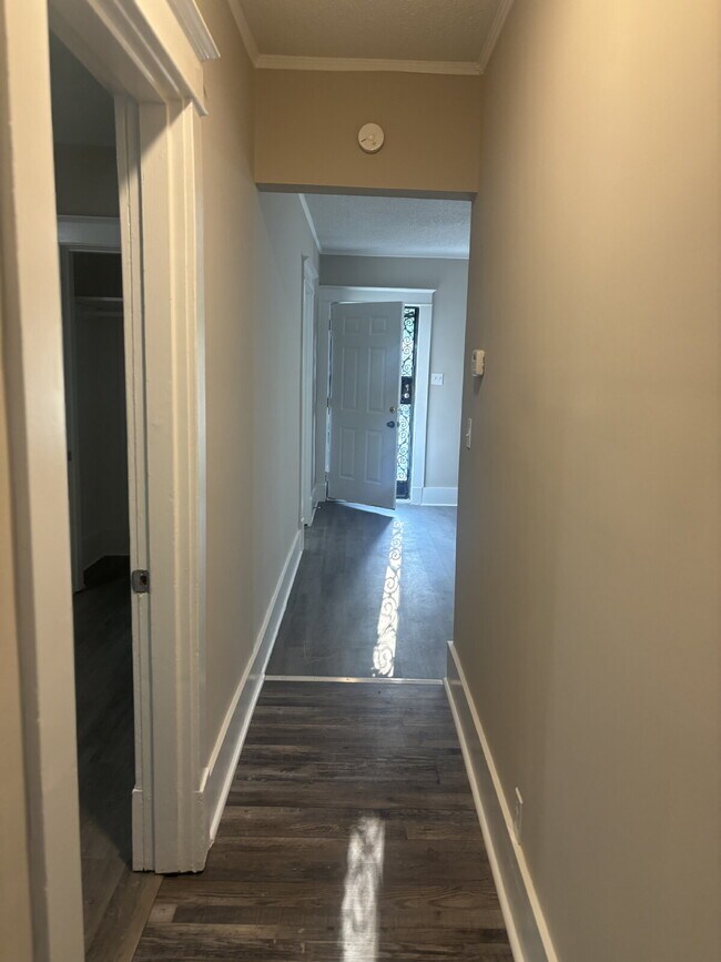 "Charming 3-Bedroom Home with Gleaming Hardwood Floors in Vibrant Memphis Neighborhood!"