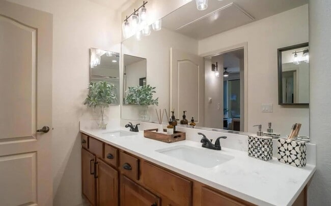 Drawers under the vanity keep the counter clear of everyday clutter.