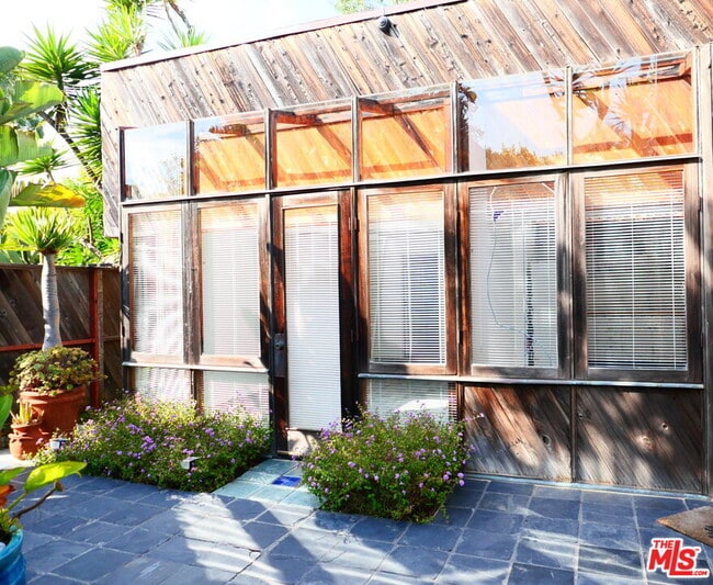 Building Photo - 6456 Surfside Way Unit Apt.