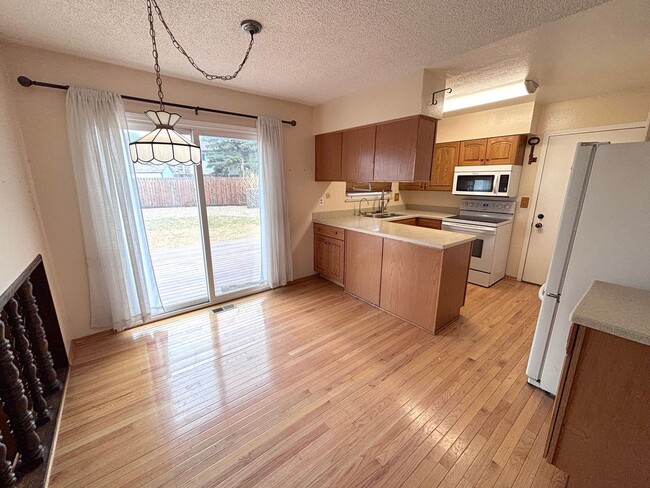 Photo - 3BR Home with Spacious Backyard & Fireplace