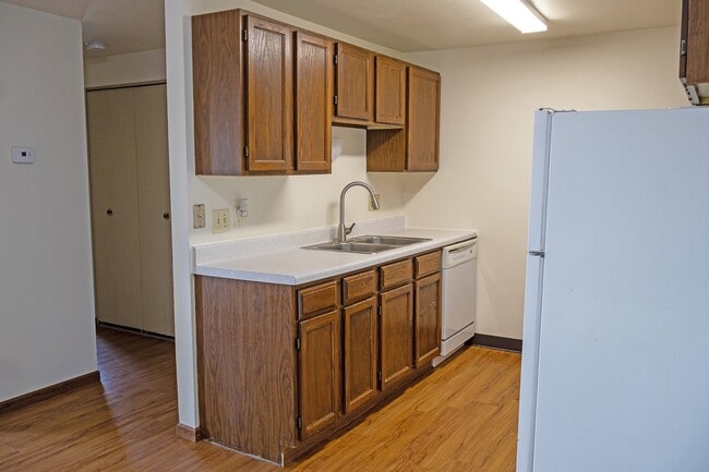 Step into stylish living at The Gallery. This well-appointed kitchen features modern appliances, ample cabinetry, and a welcoming atmosphere, perfect for culinary creations. Schedule your visit today to see your new home.