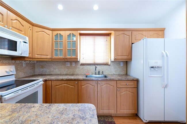 Photo - 10017 W Okeechobee Rd Unit 202