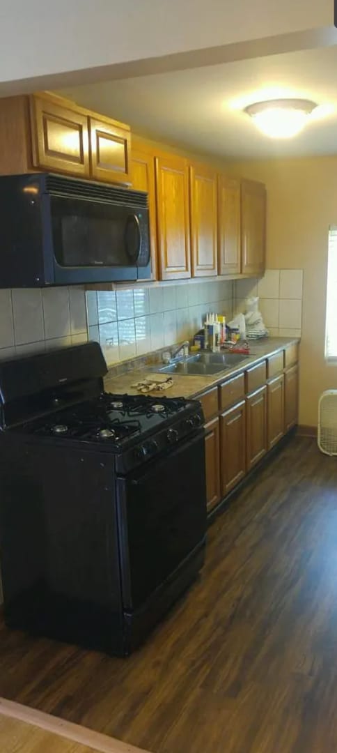Photo - Cozy 2-Bedroom Home with Basement & Off-St...