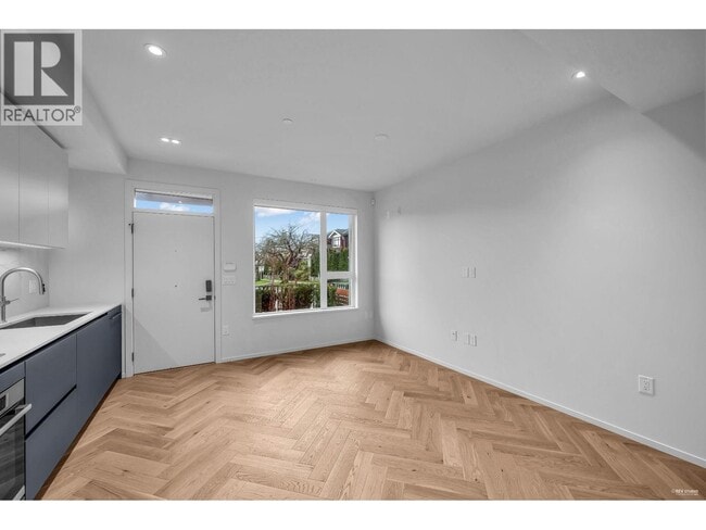 Photo - 775 W 49th Ave Unité 1xx