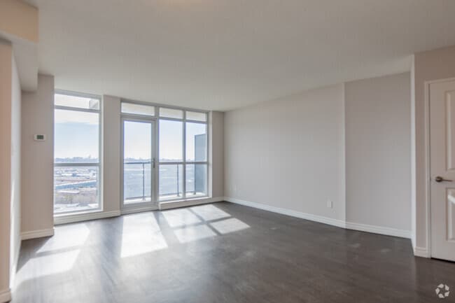 3BR, 1BA - 966SF - Living Room - Primo Tower