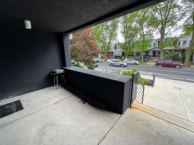 Photo - Private fenced yard! Modern, stylish & fully updated apartment! Unit 1E