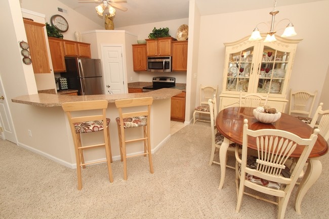 Cocina y comedor - Freedom Crossing Apartments