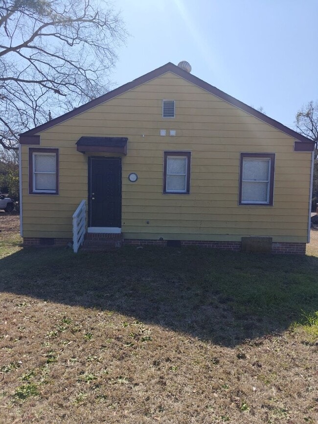 Photo - Charming 2-Bedroom Home with Spacious Yard