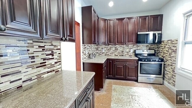 Building Photo - FRESHLY GUT RENOVATED VERY BRIGHTAND BEAUT... Unit 2A Rental