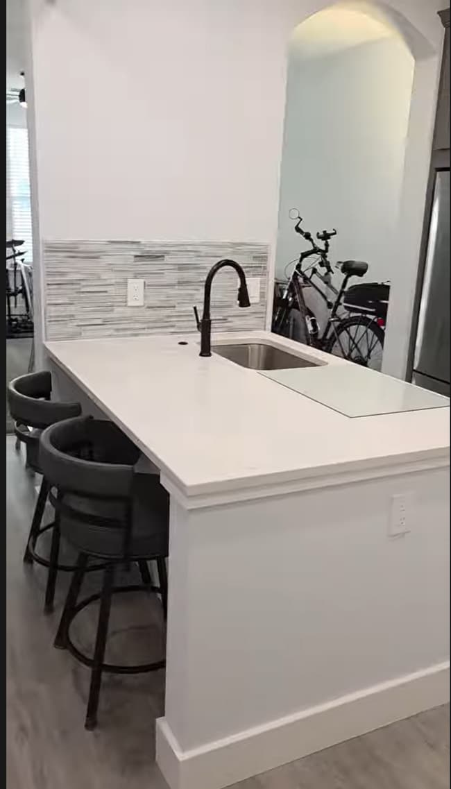 two chairs at kitchen peninsula
