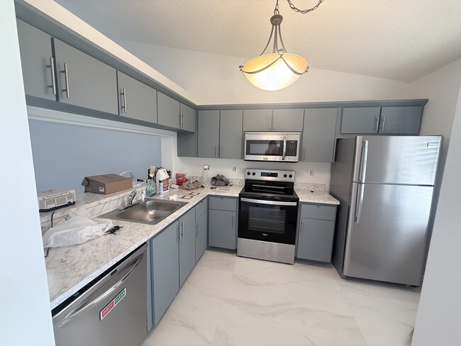 Building Photo - 22124 Palms Way Unit 205