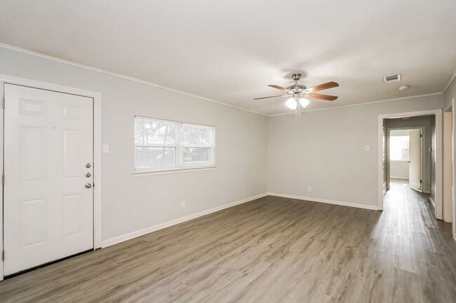 Photo - Newly Renovated Single Family Home | 4 BR/2BA | Car Covered Parking | With 2 living areas