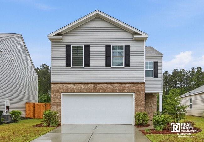Building Photo - 4 Bedroom Rental in Cane Bay Plantation with Open Layout and Pond View