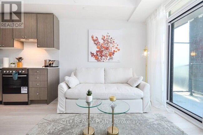 Photo - 50 George Butchart Dr Unit 211