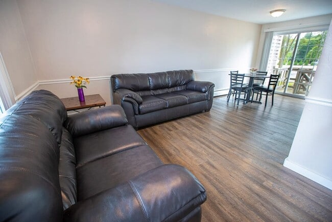 Living room with 2 leather couches