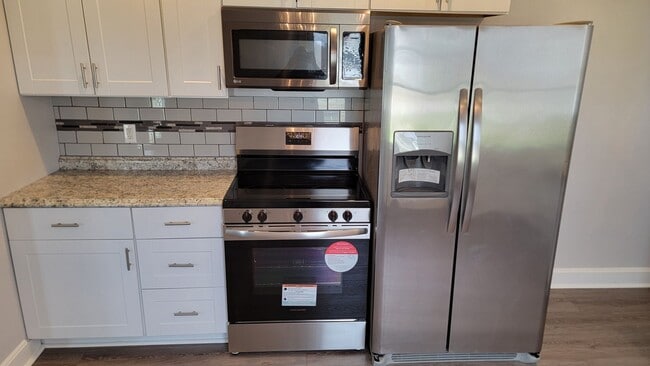 Photo - 3 Bedroom With A Finished Basement And Large Back Yard