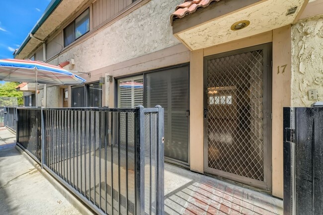 Building Photo - Freshly Updated 2-Bedroom Condo with Attached Garage in Gated Winnetka Community