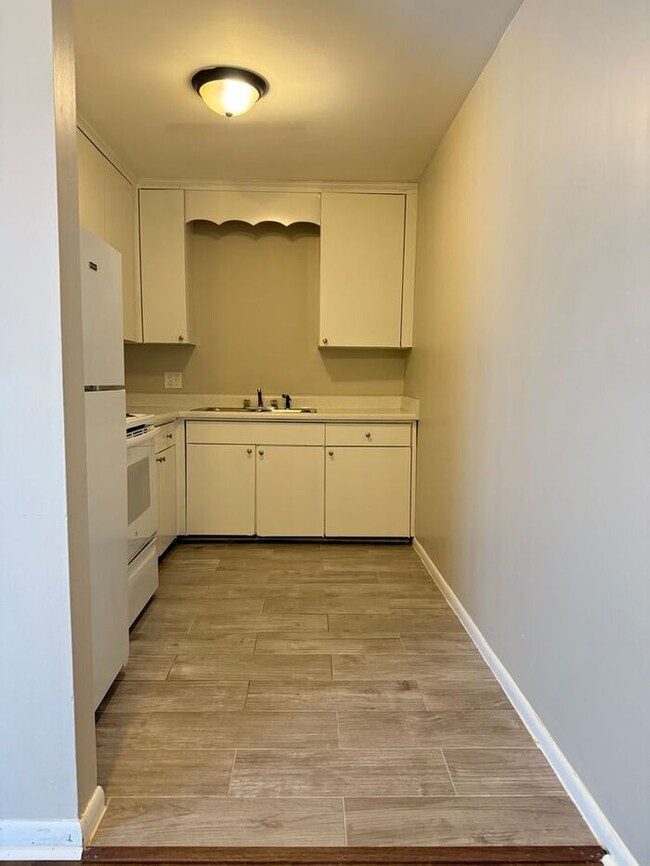 Photo - 2 Bedroom Unit was recently renovated. Live walking distance from the downtown square or steps fr...