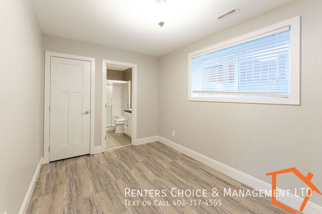 Photo - 2 Bedroom Basement Suite, Insuite Laundry, Assigned Parking